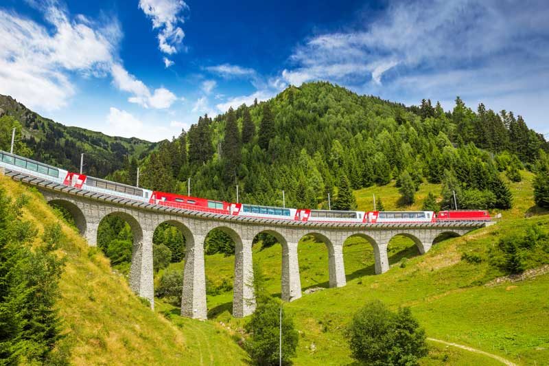Glacier Express train crossing a bridge