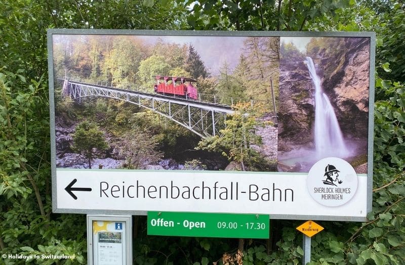 A sign showing the funicular and waterfall at Reichenbach Falls near Meiringen in Switzerland